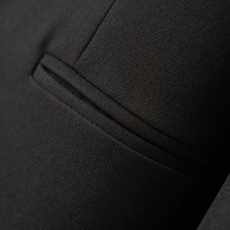 Elegant mid-length black womens blazer for autumn and winter simple one-button design with a slimming drape effect suitable for commuting