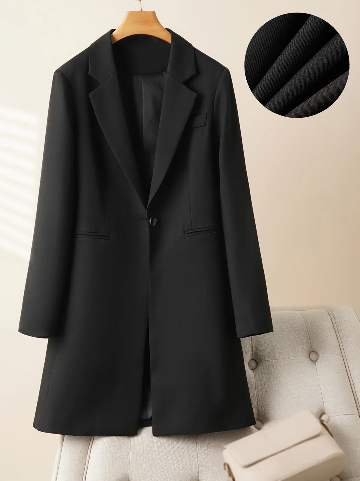 Elegant mid-length black womens blazer for autumn and winter simple one-button design with a slimming drape effect suitable for commuting
